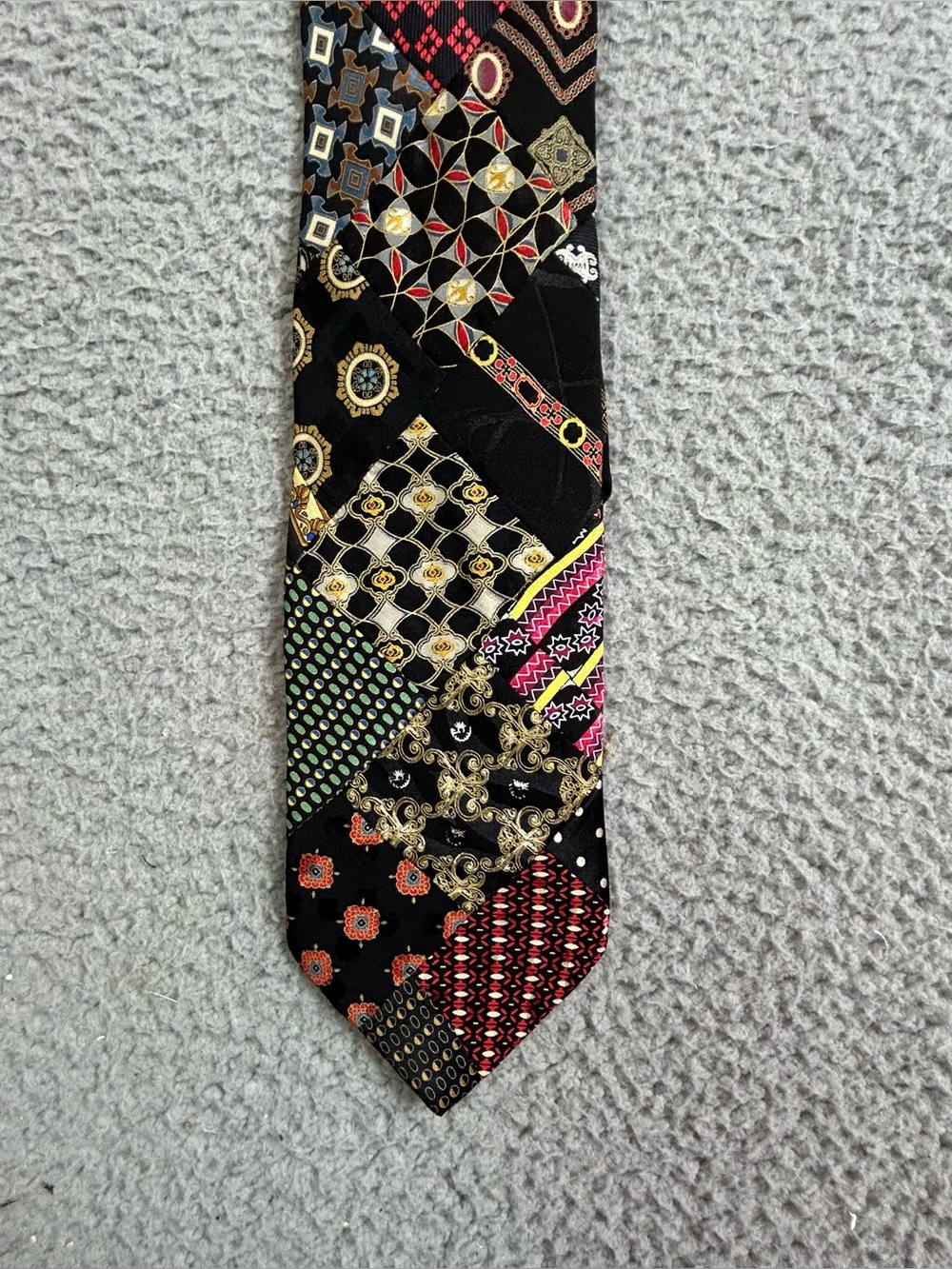 Brioni Men's Black Patchwork Pattern Silk Tie with Gold & Multicolor Accents
